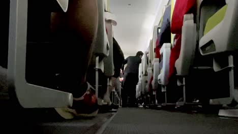 Brazil,-Pará:-Interior-view-of-a-passenger-airplane-taken-at-ground-level,-showcasing-the-rows-of-seats-and-spacious-cabin