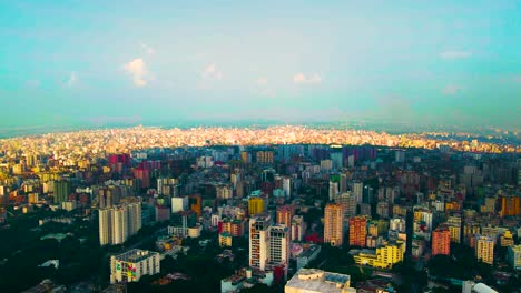 Dhaka-city-and-the-skyline-with-room-for-copy-space,-drone-descending-shot-of-the-colorful-capital-of-Bangladesh