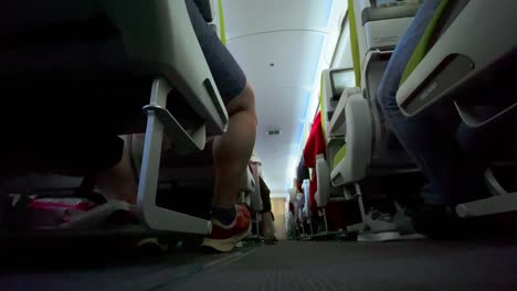 Brazil,-Pará:-Interior-view-of-a-passenger-airplane-taken-from-ground-level,-showcasing-rows-of-seats-and-the-cabin's-layout