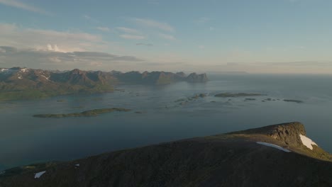 Stunning-view-of-Husfjellet-and-surrounding-islands-in-Senja,-Norway-during-a-clear-day