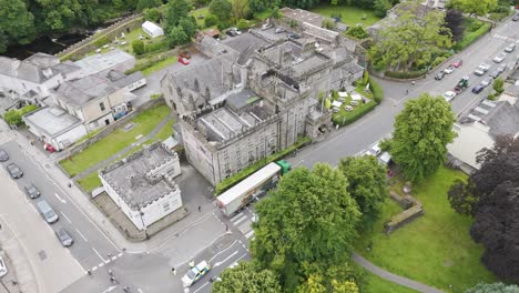 Aerial-view-of-the-historic-Bedford-Hotel-in-Tavistock,-featuring-its-unique-architecture-and-surrounding-roads,-Devon,-UK,-June-2024