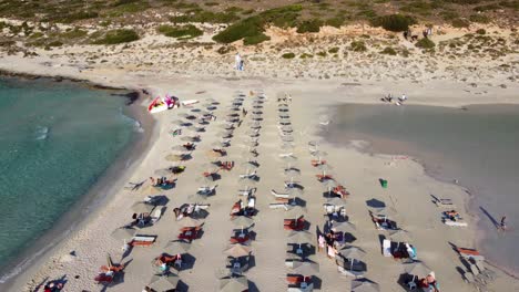 Forward-Fly-over-Balos-Beach-with-Tourists-in-Gramvousa,-Crete,-Greece