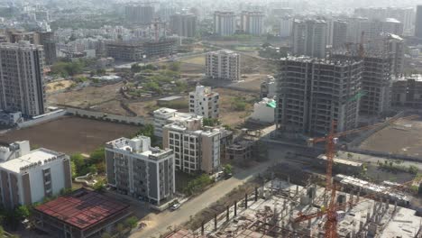 Drone-camera-is-moving-to-the-side-showing-many-high-rise-buildings