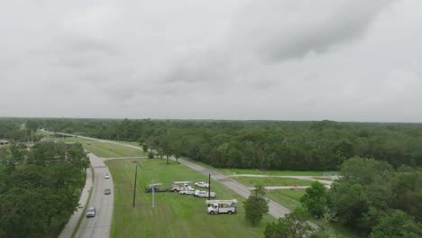 An-aerial-drone-view-of-power-company-trucks-staged-to-make-repairs-due-to-hurricane-Beryl-on-Bay-Area-Blvd