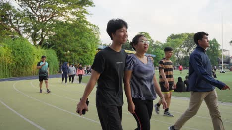 Active-People-Walking-And-Jogging-At-Ahmad-Yani-Square-In-Tangerang-City,-Indonesia