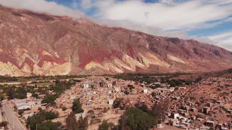 Aerial-drone-view-of-a-cemetery-located-on-the-summit-of-a-hill-in-northeastern-Argentina,-in-the-Andes-region