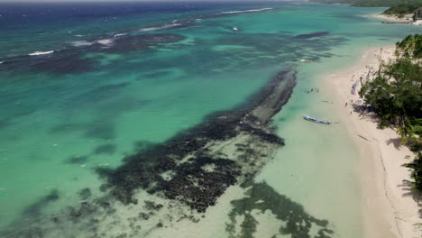 Nice-pan-down-aerial-shot-blue-sky-turquoise-water-in-st