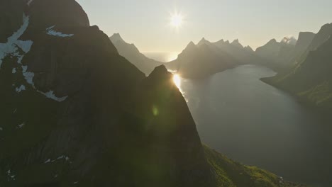 Mountain-peaks-Reine-in-Lofoten-during-sunset,-aerial-view