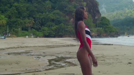 The-tropical-beaches-of-Trinidad-and-Tobago-host-a-young-African-girl-in-a-bikini-walking-to-the-ocean