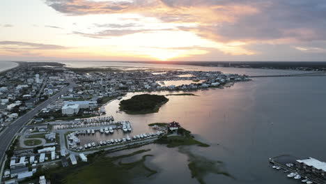 Cinematic-aerial-shot-of-sun-setting-over-Atlantic-Beach-North-Carolina