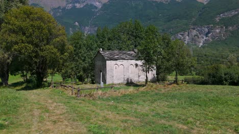 Aerial-View-Of-Novalesa-Abbey-Chapel-located-in-the-scenic-Turin-region-of-Piedmont,-Italy