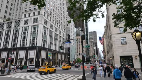 A-standard-busy-street-with-people-and-traffic-shot-in-4K-in-New-York-City-in-the-early-summer-of-2024