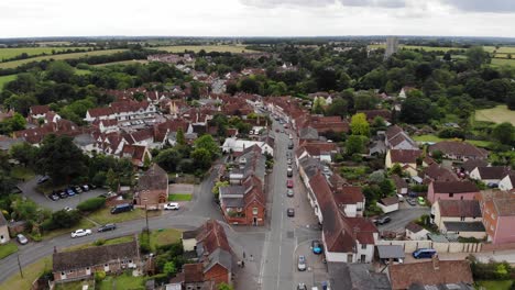 Flying-drone-shot-of-the-famous-Lavenham-village-in-Suffolk,-UK