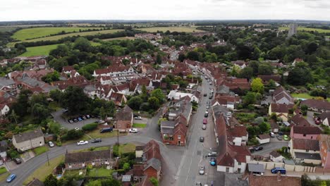 Reveal-drone-shot-of-Lavenham-which-is-a-well-preserved-medieval-village-in-Suffolk,-UK