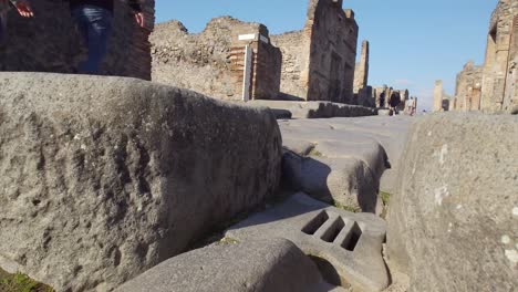 Close-up-of-ancient-zebra-crossing-footpath-with-stepping-stones-in-the-streets-of-Pompeii---Naples,-Italy