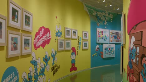 Colorful-Smurfs-Art-Display-at-JC-Cartoon-Art-Museum-in-dolly-in-shot