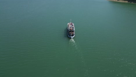 aerial-of-sightseeing-ferry-on-Lake-Bicaz-in-western-Romania