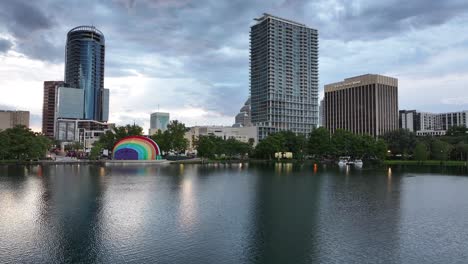 Aerial-flyover-Lake-Eola-in-Orlando-Downtown-with-skyscrapers-in-background