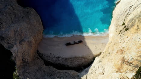 Downward-angle-drone-shot-of-shipwreck-at-Navagio-Beach