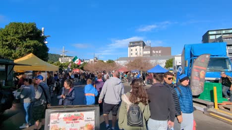 Visiting-and-walking-through-weekend-fruit-and-vegetable-market-with-food-and-coffee-stalls-in-capital-city-of-Wellington,-New-Zealand-Aotearoa