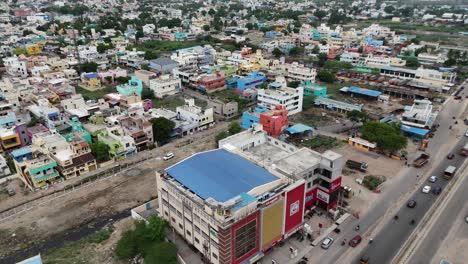 Daytime-drone-footage-of-the-highway-during-a-holiday,-showing-lighter-than-usual-traffic-and-a-more-relaxed-atmosphere