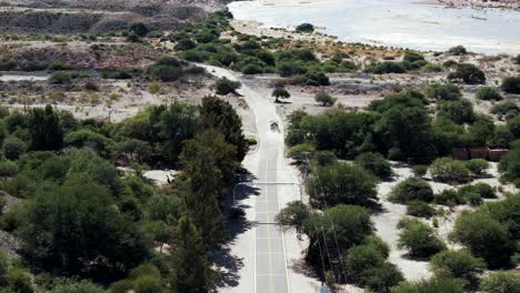 Truck-traversing-Ruta-40-on-an-unpaved-stretch-in-the-middle-of-the-desert-in-Argentina