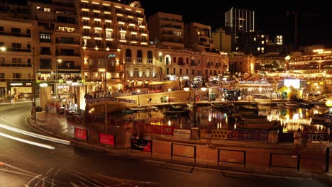 Timelapse-of-England-and-Spain-supporters-leaving-the-giant-screen-after-the-Euro-Cup-2024-football-game-final-in-the-center-of-St-Julian's,-Malta,-at-night