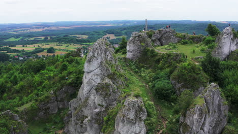 Drone-shot-of-Tourists-sightseeing-Zborow-Mountain-climbing-region-overlooking-nature-reserve