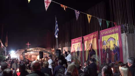 Crowd-gathered-to-celebrate-the-resurrection-of-Christ,-at-small-orthodox-church-in-Greece