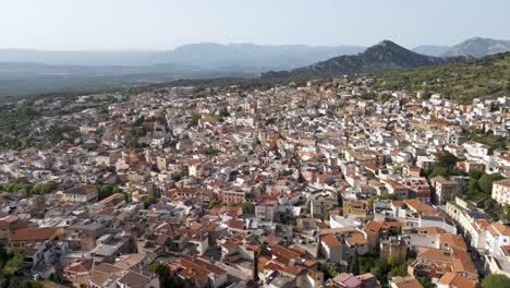 Italian-Mountain-Town-of-Dorgali,-Sardinia,-Aerial-Panorama-Landscape