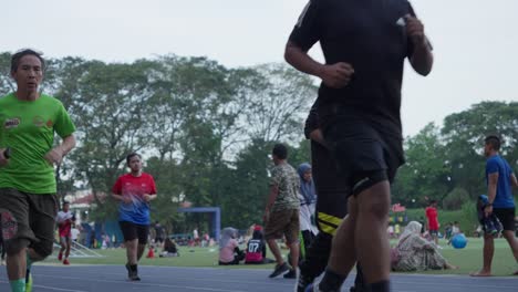 People-Jogging-In-Early-Morning-At-Ahmad-Yani-Square-In-Tangerang-City,-Indonesia