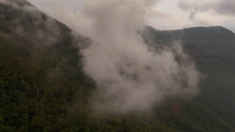 aerial-view-of-a-mountain-whit-beautiful-mist,-fog