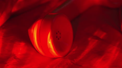 close-up-of-telephone-handset-vintage-retro-with-red-soft-light