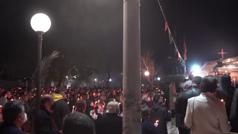 Crowd-gathered-to-celebrate-the-resurrection-of-Christ,-at-small-orthodox-church-in-Greece