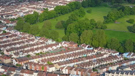 Neat-rows-of-residential-townhouses-in-Bedminster-next-to-Victoria-Park,-aerial