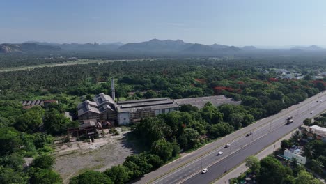 Aerial-view-of-a-large-industrial-plant-adjacent-to-the-highway