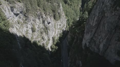 exciting-fast-moving-aerial-of-Bicaz-Chei-mountain-river-valley,-Bicaz-Gorge,-Romania