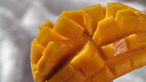 Hand-Cut-and-Carving-Ripe-Yellow-Mango,-Close-Up