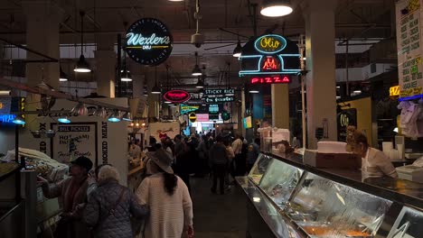 Food-Court-in-Grand-Central-Market,-Los-Angeles-CA-USA,-People-Between-Fast-Food-Restaurants