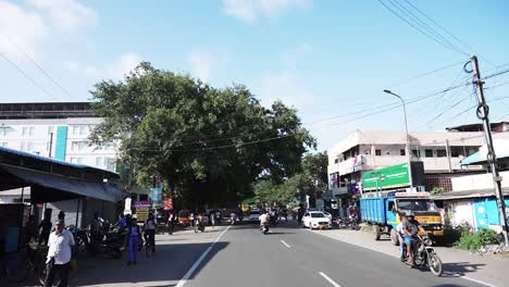 POV-driving-through-a-busy-street-in-Coimbatore,-India