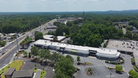 Aerial-view-of-shopping-mall-in-american-suburb-during-sunny-day