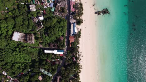 Boracay-beach-in-the-philippines-shot-from-a-drone-from-a-birds-eye-view,-capturing-the-beautiful-beach-and-people-enjoying-paradise