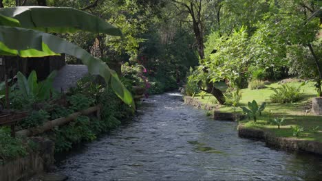 SLOW-MOTION-STATIC-SHOT-OF-CUPATITZIO-RIVER-IN-URUAPAN-MICHOACAN