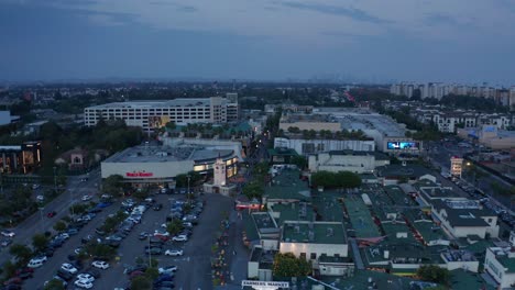 Wide-panning-shot-of-The-Grove-and-Farmers-Market-during-sunset-in-Los-Angeles,-California