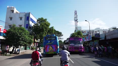 POV-driving-through-a-busy-street-of-Coimbatore,-Tamil-Nadu