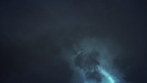 Cloud-Lightning---Eerie-spectacular-and-dramatic-lightening-storm-illuminating-the-inside-of-dark-and-sullen-clouds-with-brilliant-and-intense-bolts-and-flashes-of-pale-blue-lightning