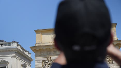 Bokeh-shot-of-the-crowd-enjoying-the-DJ-ontop-of-the-Triumphal-arch-at-the-olympics