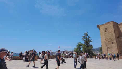 Tourists-front-of-La-Seu-cathedral-Palma-de-Mallorca-capital-city-gothic-attraction