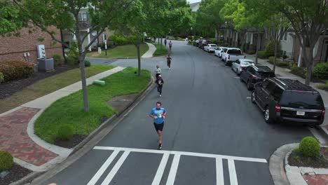 Jogging-People-on-street-of-american-city-neighborhood-of-Georgia,-USA