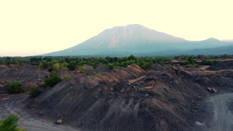 Tianyar-savanna-in-bali-with-mount-agung-in-the-background,-aerial-view